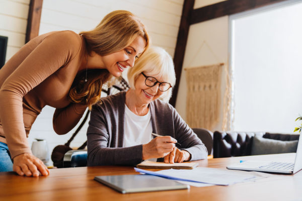 Woman helps elderly mother plan and write her living trust