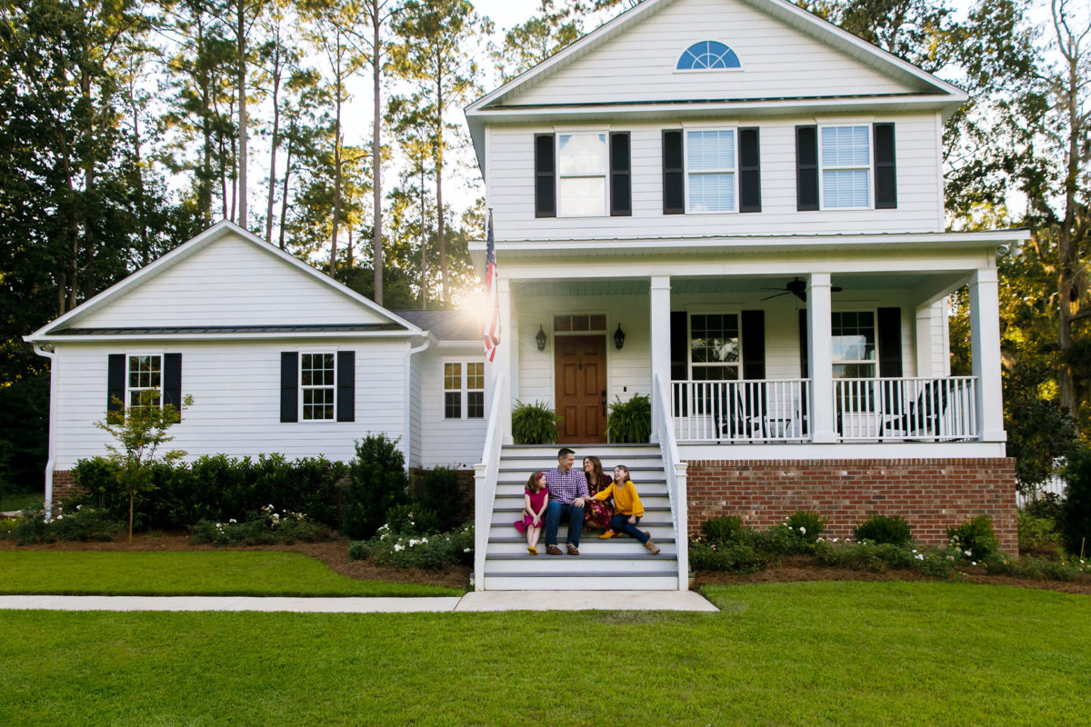 family gathered on family home stoop