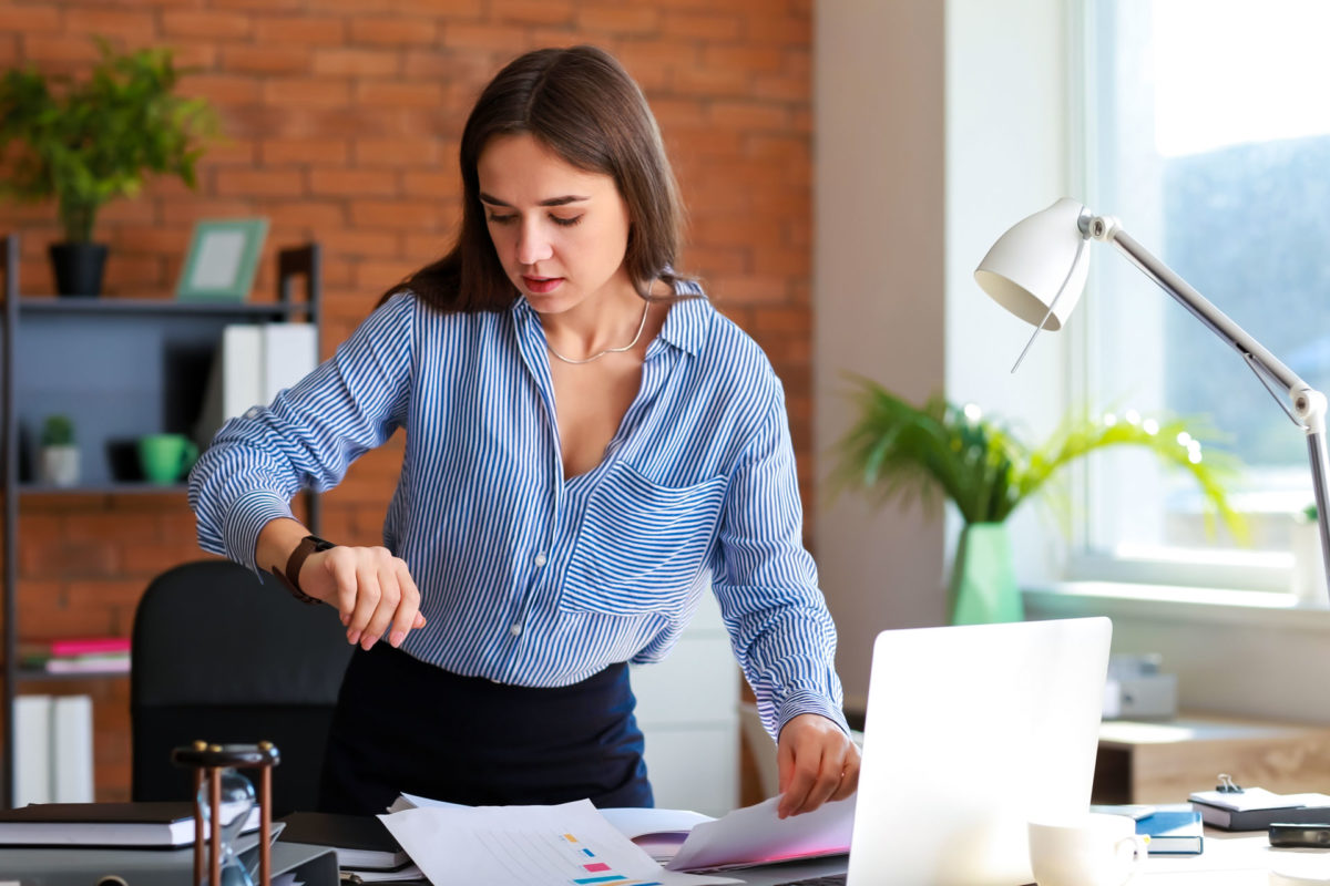 woman practices valuable time management skills at work