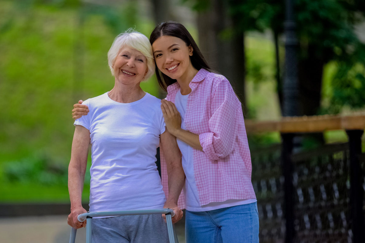 young woman takes on role of caregiver for her elderly parent