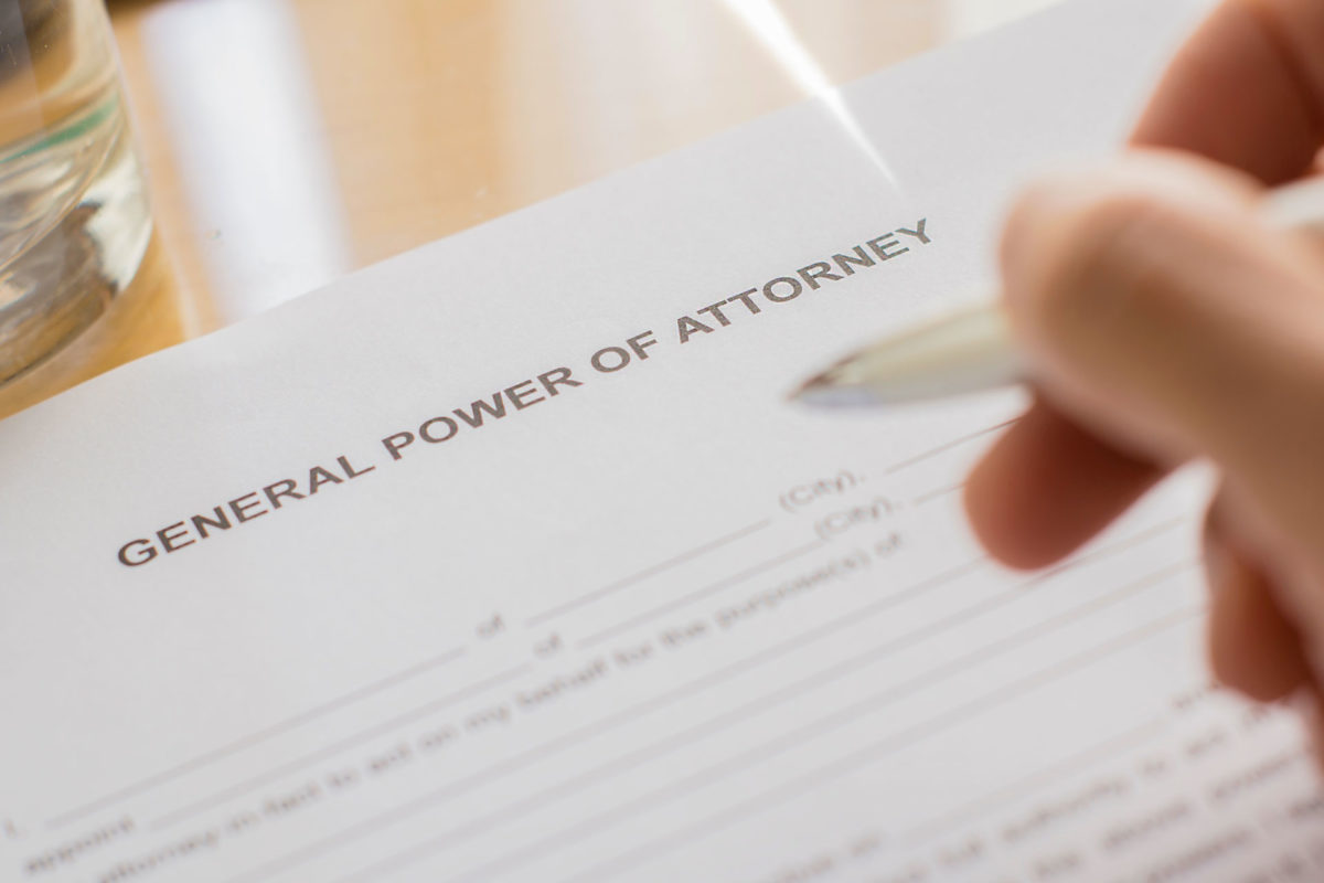 person signing documents titled power of attorney