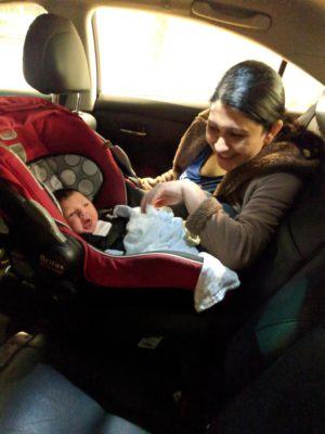 lalit and his wife taking their newborn baby back from the hospital