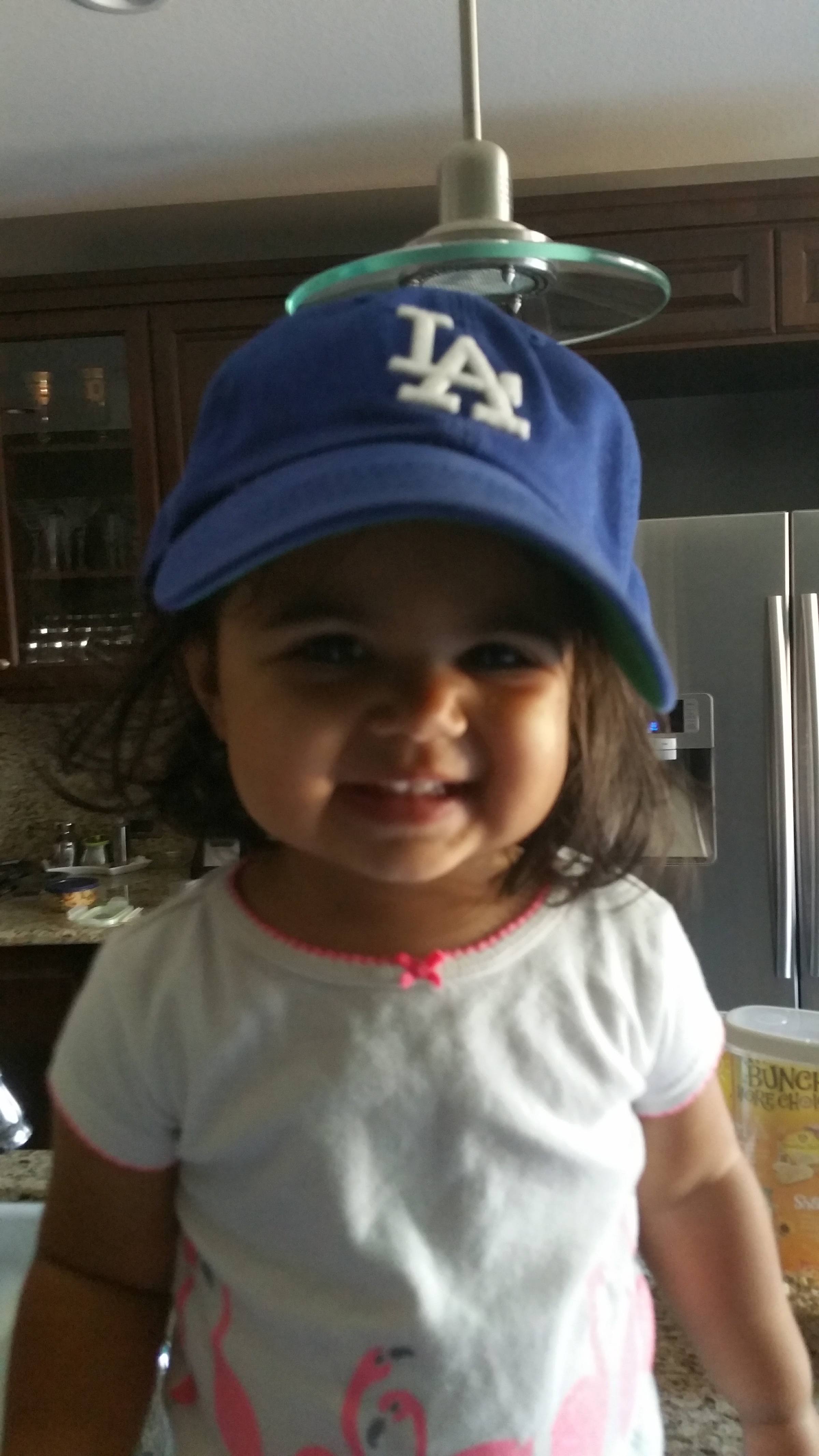 sonam wearing an LA angels baseball hat