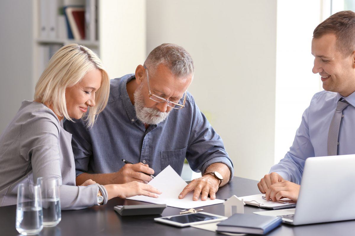 senior couple debates adding their child to the house deed